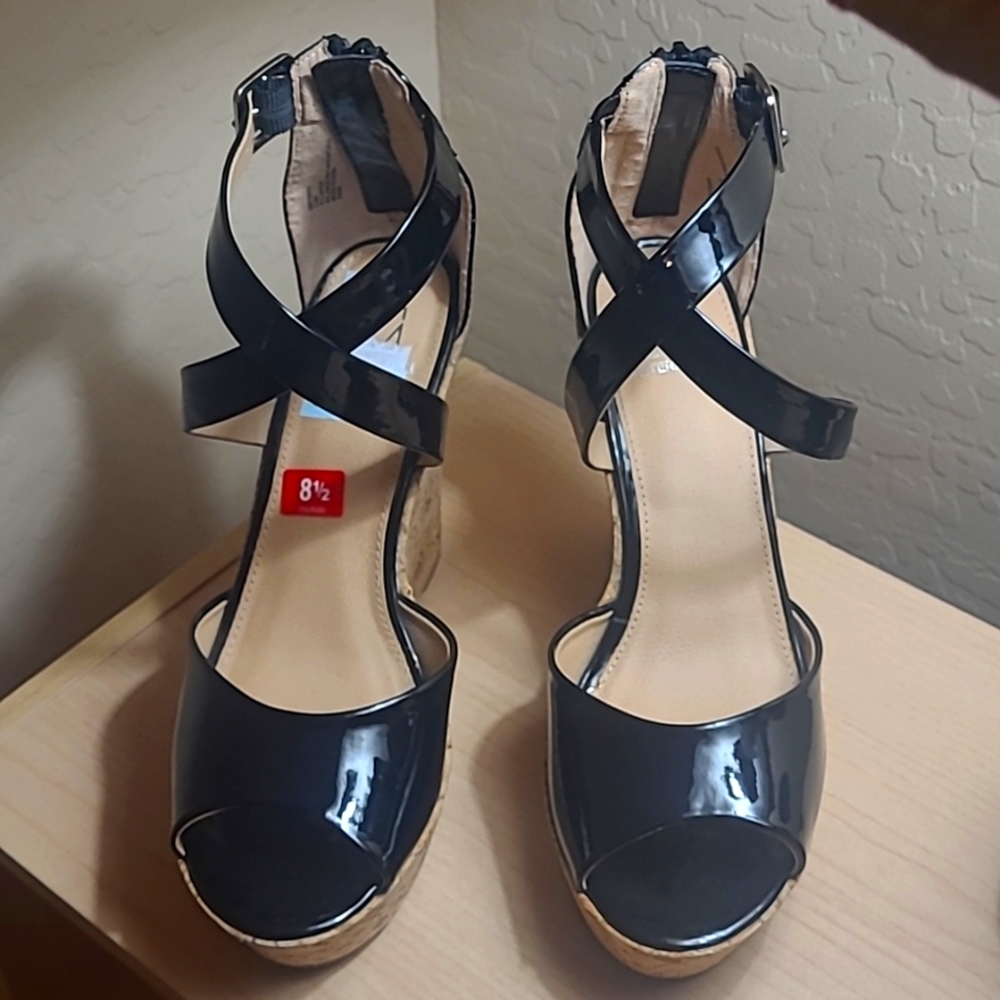MATERIAL GIRL...Patent  black Wedge Heels, Size 8.5 , 4.5 inches tall, NEW.